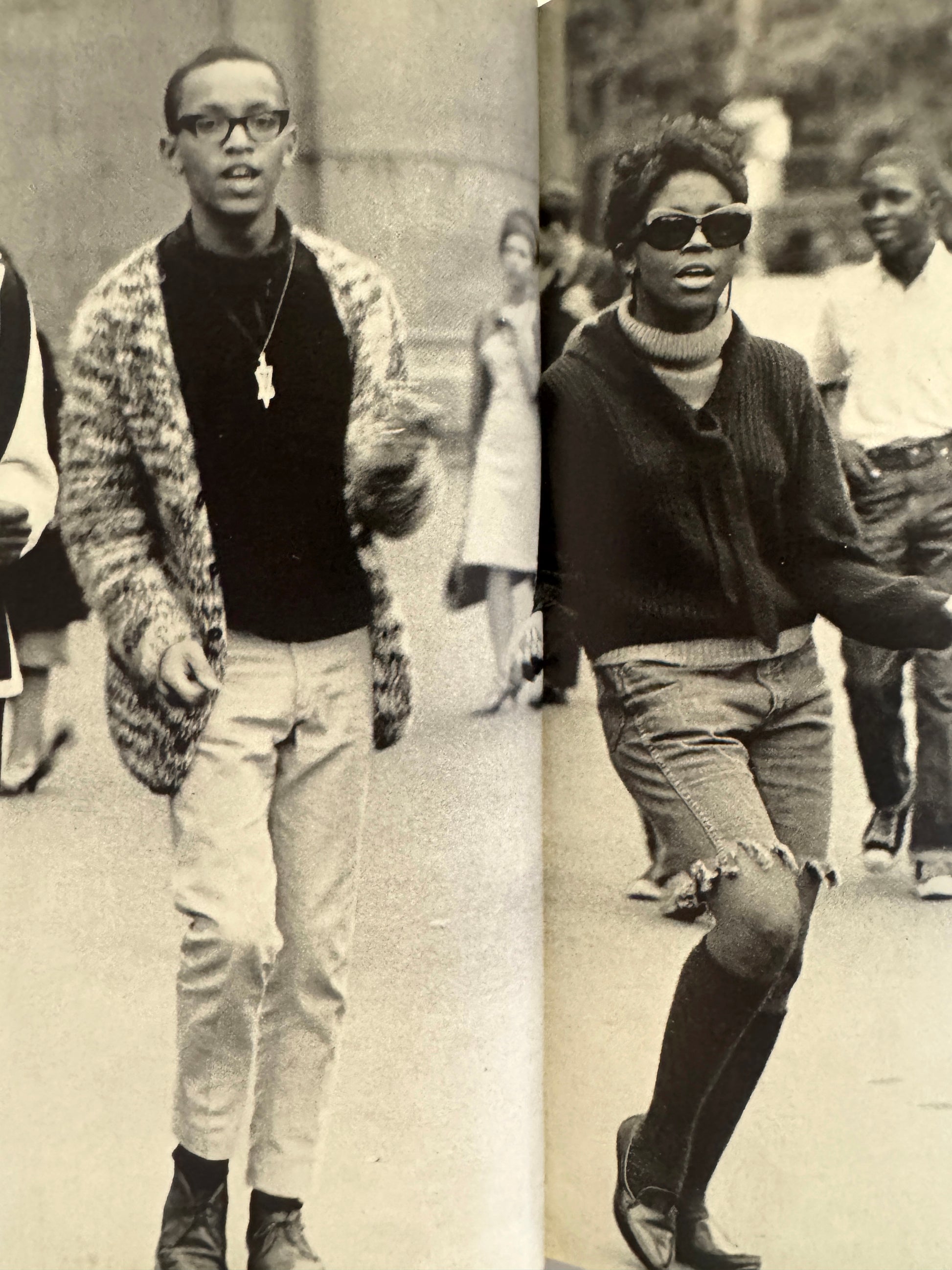 Interior shot - SUMIHARU WATANABE
Face of Washington Square (Washington Hiroba no Kao), 1965. Two black and white photos of people from the past, one with a person in a patterned coat and glasses, the other with a person in sunglasses and a turtleneck.