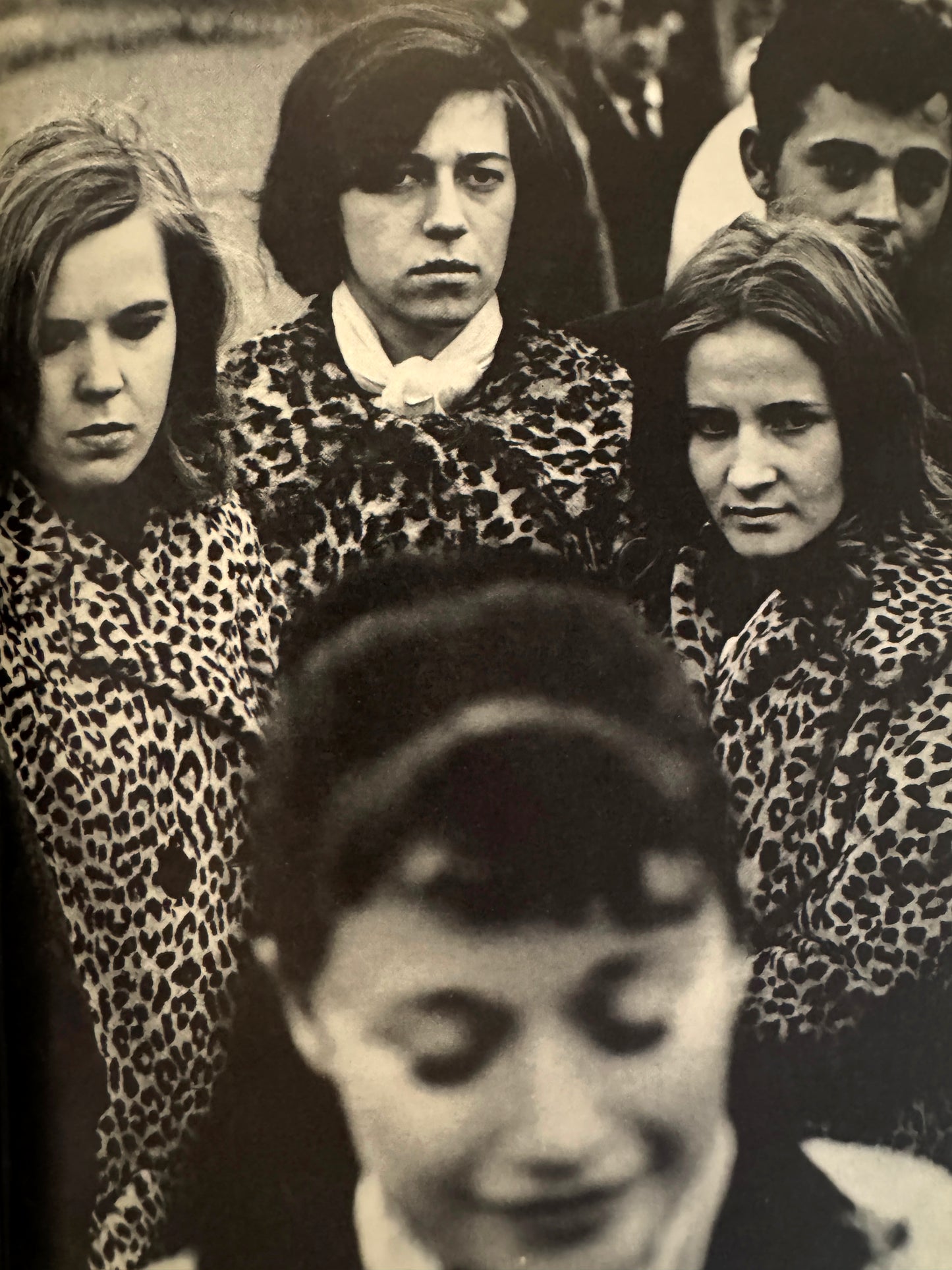 Interior shot - SUMIHARU WATANABE
Face of Washington Square (Washington Hiroba no Kao), 1965. Black and white photo of people wearing leopard print coats.